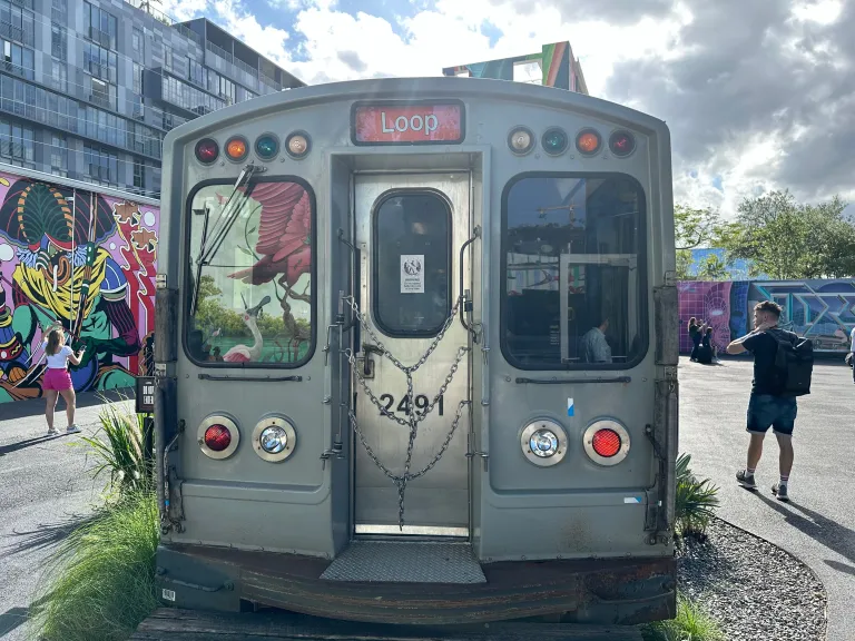 A retired Chicago 'L' 2400-series car at the Wynwood Walls, car number 2491